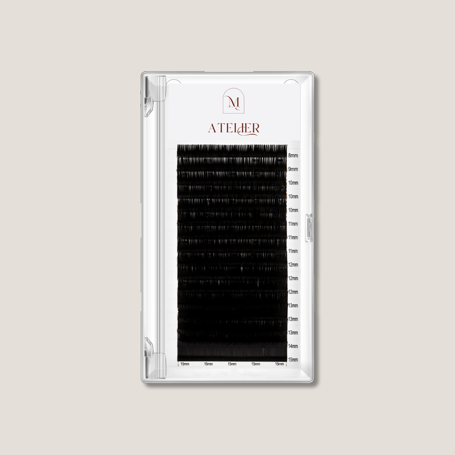 Eyelash extension tray with 'ATELIER' branding on a light gray background

